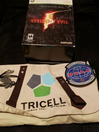 Resident Evil 5 Collectors Tricell Bag,  Necklace,  Bsaa Patch,  And Box