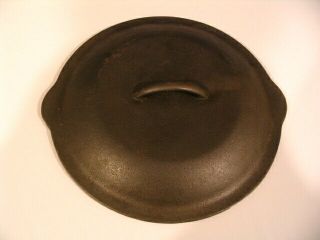 Cast Iron Lid,  10 1/2 ",  8 With Double Pour Covers