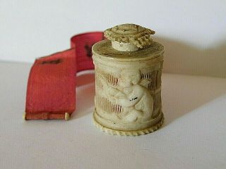 Antique 19th Century Sewing Tape Measure,  Cherub Holding A Bird Design