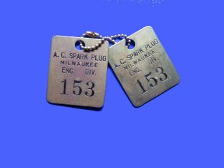 A.  C.  Arnold Champion Spark Plug Brass Factory Locker Parts Tags Engine Division