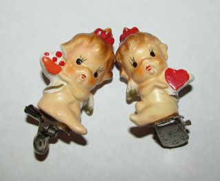 2 Vintage Christmas Clip Ornaments Porcelain Cupid Angel Cherub Figures 2.  25 "