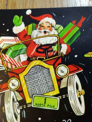Vintage Christmas Card Santa I antique car with gifts 2