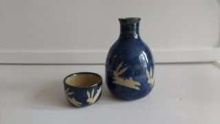 Japanese Sake Bottle & Cup Set Ceramic Blue Glaze With Bunnies Bottle 4.  75 " Tall