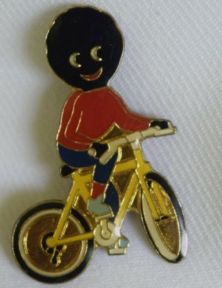 Vintage Black Americana Boy On A Bike Pin James Robertson & Sosn Ltd.