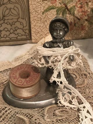Vintage Pewter Thimble Bobbin Thread Needle Holder Little Girl In Bonnet / Apron