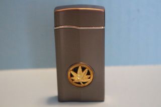 Butane Torch Lighter With Marijuana Leaf On The Front Lights Up When Top Is Open