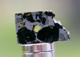 Admire Pallasite Meteorite,  2.  5 grams,  Kansas 3