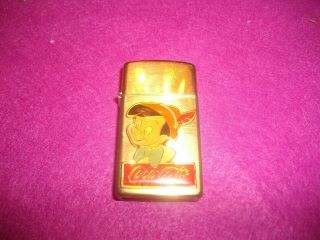 Coke/ Disney Pinocchio Brass Slim Zippo Lighter