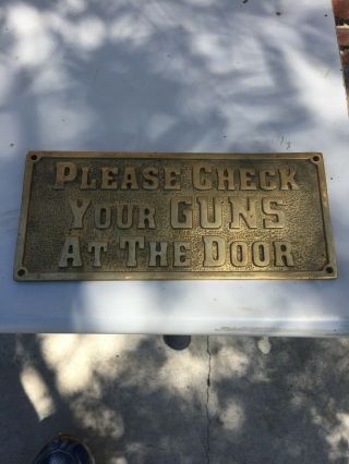 Brass Sign “please Check Your Guns At The Door” Approx 3 1/2” X 8”