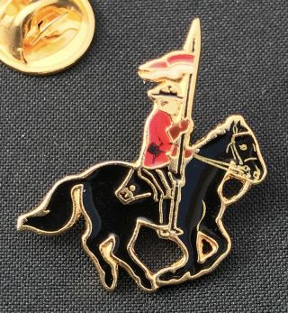 Royal Canadian Mounted Police,  Mounties,  Horse Lapel,  Tie Pin.  Embossed Enameled