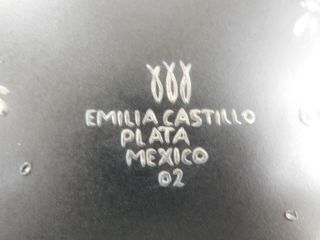 Emilia Castillo Signed 9.  5 