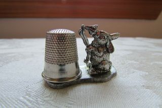 1979 Metzke Pewter Rabbit smelling a flower magnetic thimble holder Has Thimble 3