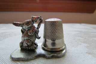 1979 Metzke Pewter Rabbit smelling a flower magnetic thimble holder Has Thimble 4