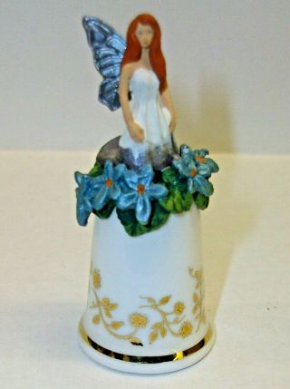 A Sterling Classic Flower Fairy Thimble With - - Blur Flowers - - And Gold Pattern