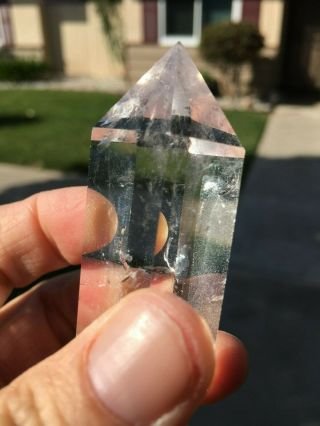 Double terminated polished clear quartz crystal point from Brazil 3