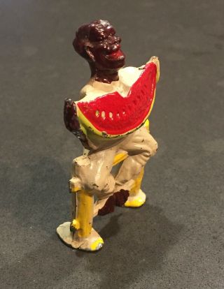 Antique Cast Iron Black Americana Figurine Sitting on Fence Eating Watermelon 2