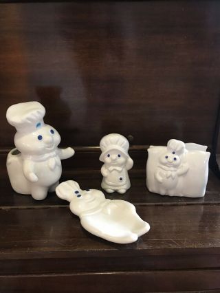 Set Pillsbury Doughboy Napkin Holder,  Spoon - Rest,  Shaker & Utensil Holder - 1988