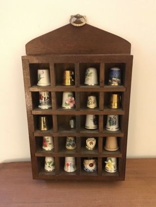 VINTAGE SET OF THIMBLES WITH WOOD DISPLAY SHADOW BOX,  PRICE IMPORTS 2