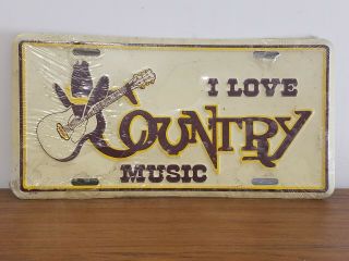 Vintage Metal Embossed I Love Country Music Novelty License Plate In Shrink