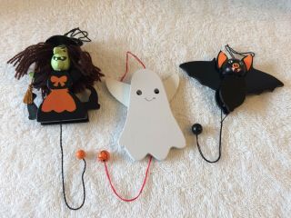 3 Movable Halloween Ornaments: Witch,  Ghost,  Bat.  Arms Move With Pull Cords