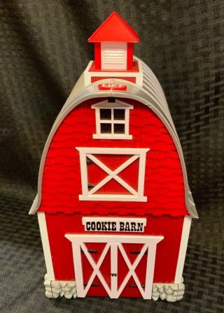 The Cookie Barn Cookie Jar Plays " Green Acres Theme Song " When Opened.
