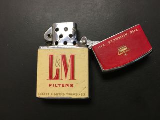 Cigarette lighter by Continental L&M 2