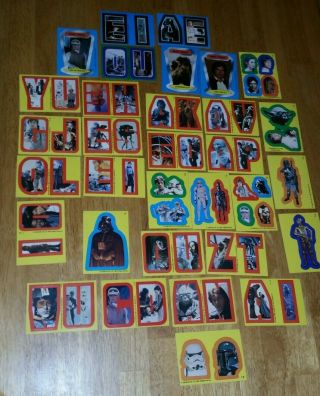 32 1980 Topps Star Wars Empire Strikes Back Stickers - 26 Yellow,  6 Blue
