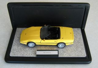 1:24 Franklin 1986 Chevrolet Corvette Yellow & Franklin Display Case