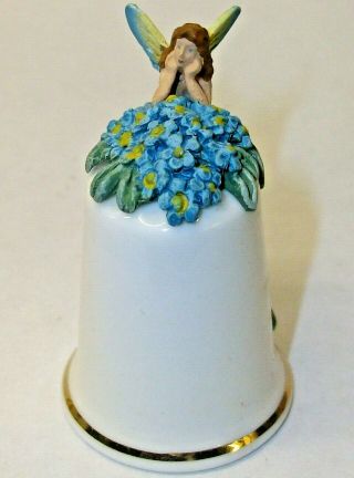 Sterling Classic Bone China Thimble A Fairy Leaning On A Bunch Of Blue Flowers