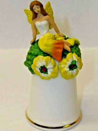 Sterling Classic Bone China Thimble A Fairy Sitting On A Bunch Of Yellow Flowers