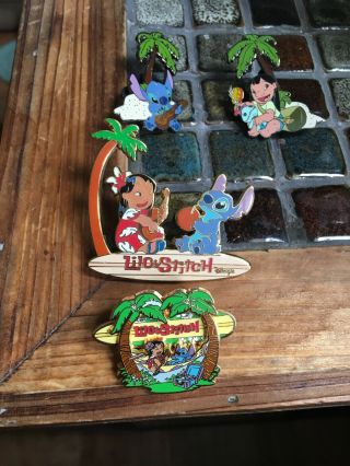 Stitch Playing Guitar Under Palm Tree Disney Pin Plus 3 Others (shown)