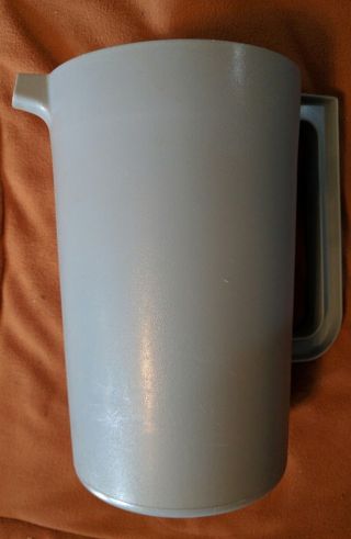 Tupperware Blue 1416 One Gallon Pitcher With Almond Plunger Top.
