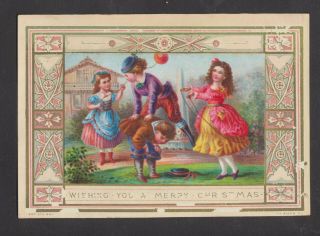 C6905 Victorian Marcus Ward Xmas Card: Children Playing 1870s