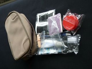 Airline On Board Amenity Pack.  Delta Airlines Tan Zip Bag.
