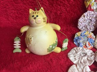 Cute Vintage Fishing Fat Cat With Live Fish And Fish Bones Dangling From Paws
