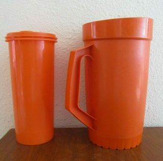 2 Vintage Tupperware Orange Pitchers With Lids
