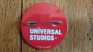 Rare vintage universal studio lenticular button - The movie Earthquake 4
