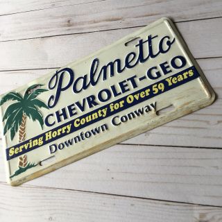 Palmetto Chevrolet - Geo Downtown Conway License Plate Vtg Dealer Tag Palm Tree