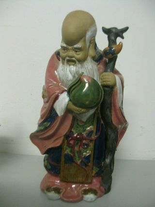 Vintage Asian Mud Man Figurine With Walking Stick And Closed Lotus Flower