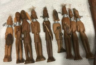 Wooden Statue Figures (9) and a fork figure and spoon figure 2