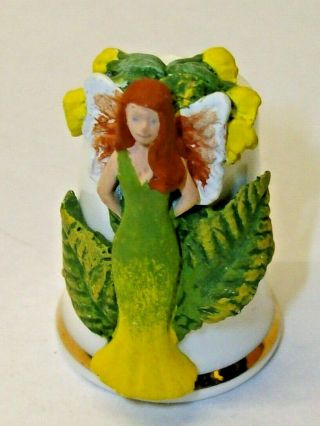 Sterling Classic Bone China Thimble Fairy With A Bunch Of Yellow Flowers 2