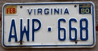 6 - Digit Blue And White Virginia License Plate With A 1980 Sticker