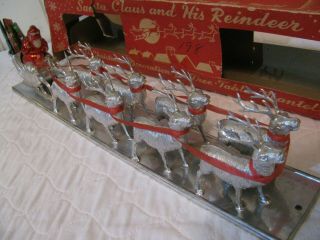 Vintage Silver Hard Plastic Santa Claus And His Reindeer Sleigh Gifts