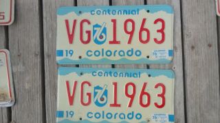 Centennial 1976 License Plates Red White Blue Pair