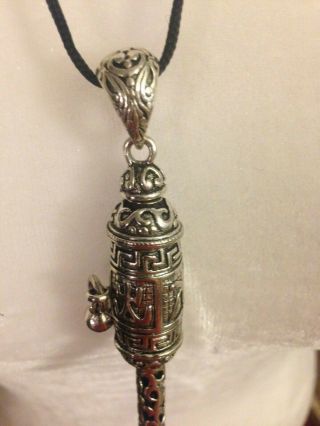 Tibetan Silver Buddhist Revolving Prayer Wheel Om Pendant On Black Cord Necklace