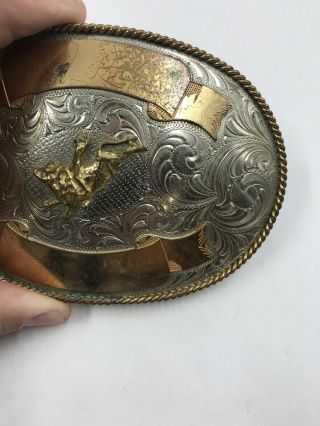 Vintage Montana Silversmith Nickel Silver Gold Belt Buckle Rodeo Bull Rider XLRG 6