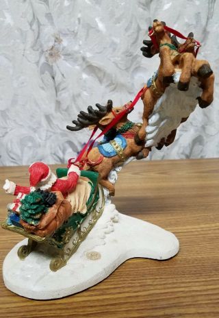 Santa & Flying Reindeer Figurine Designed By Jarmy