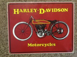 Pre Owned Harley Davidson Tin Sign.  14” L X 11” H.  Slight Scratches.  See Photo.