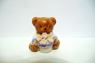 Thimble Handpainted Bisque Joel Figural Of Teddy Bear Holding A Pot Of Flowers