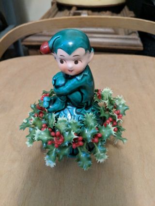 Vintage Inarco Christmas Pixie Elf Sitting On A Circle Of Holly